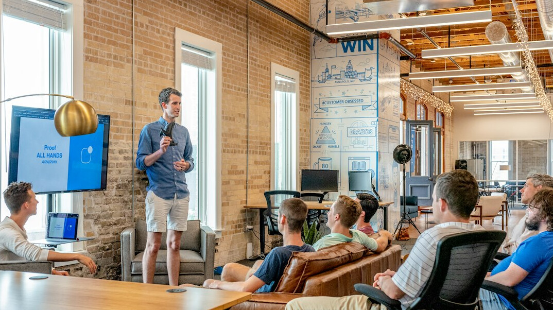 manager leading team meeting